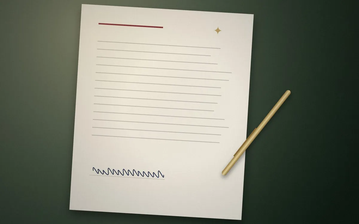Close-up of a signed document and brass pen clip